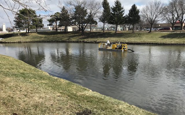 The dredge machine, the dino6, out in action on a cloudy day